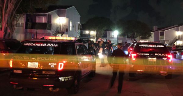 Harris County police officers responding to a shooting at an apartment building on May 30, in Harris County, Texas.