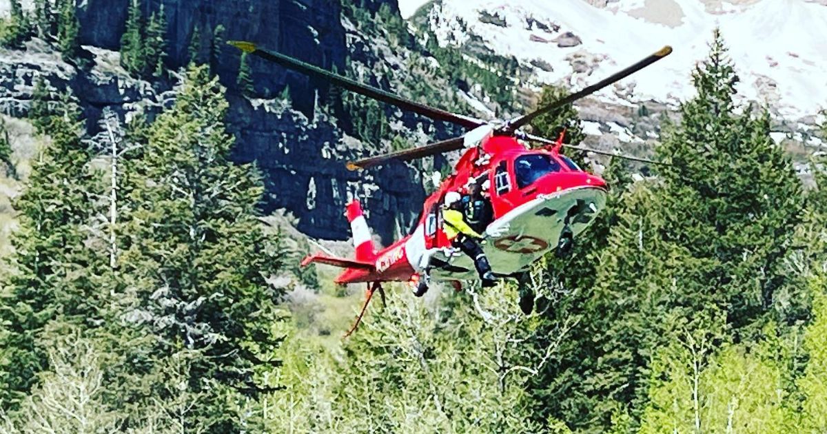 A woman in Utah is rescued via helicopter.