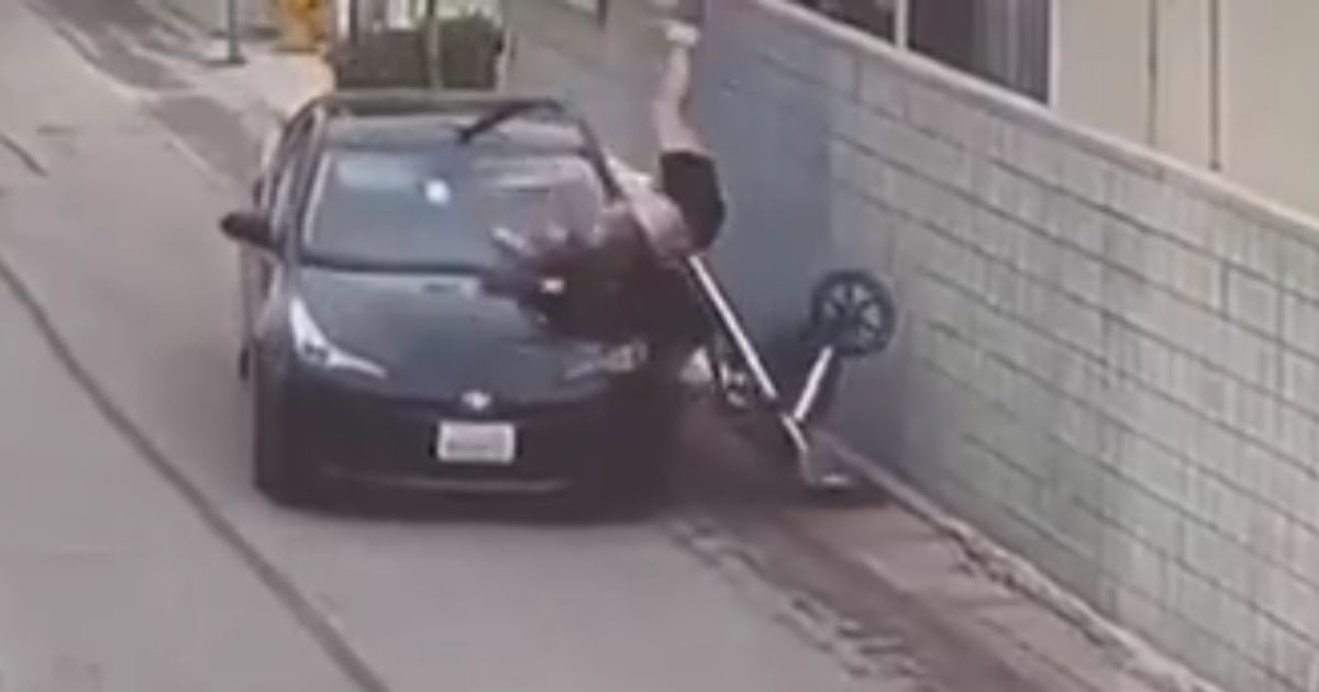 When she saw the driver swerve toward her, the mother lifted the stroller to try to protect her child before the car hit them.