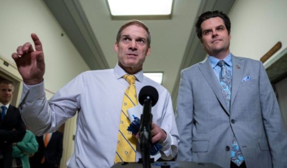 GOP Reps. Jim Jordan of Ohio and Matt Gaetz of Florida, seen in a photo from June 2021, are demanding answers from the FBI after this week's revelation that the federal agency since 2012 has maintained a secure workspace at Perkins Coie, a law firm that handles prominent Democrat clients including Hilary Clinton.