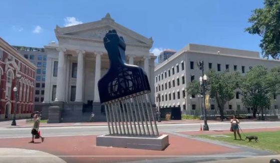 Prior to Juneteenth, New Orleans Mayor LaToya Cantrell unveiled a two-story statue in Lafayette Square to commemorate the holiday. The statue is a gigantic hair pick, which features a peace sign and clenched "black power" fist on its handle.