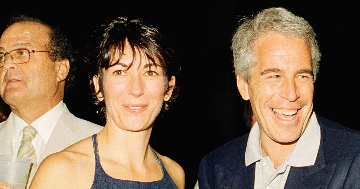 Ghislaine Maxwell, left, and Jeffrey Epstein, right, pose during a party at the Mar-a-Lago club, Palm Beach, Florida, February 12, 2000.