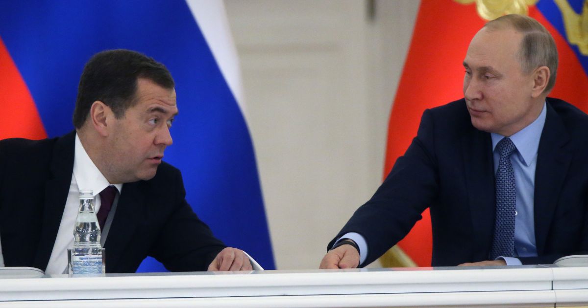 Dmitry Medvedev, left, Deputy Chairman of Russia's Security Council, is seen with Russian President Vladimir Putin in a 2019 photo. Medvedev made dramatic references to unleashing the horsemen of the apocalypse in a news interview while discussing outside aid to Ukraine.