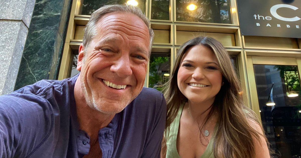 Mike Rowe poses with Allyssa Hagaman outside the CUT barbershop in Charlotte, North Carolina.