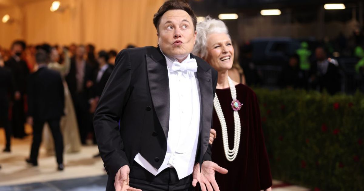 Elon Musk, seen at the May 2 Met Gala in New York City with his mother, Maye Musk, has some grim predictions for the economy - and for remote workers.