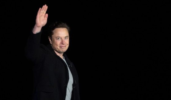 Elon Musk gestures as he speaks during a news conference at SpaceX's Starbase facility in South Texas on Feb. 10.