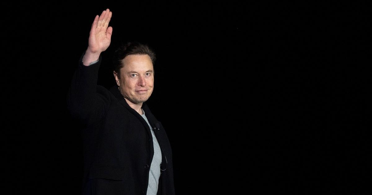 Elon Musk gestures as he speaks during a news conference at SpaceX's Starbase facility in South Texas on Feb. 10.