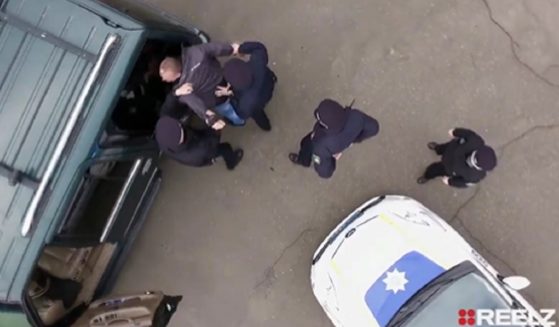 An overhead shot of an arrest from the new "On Patrol: Live," the rechristened "Live PD."