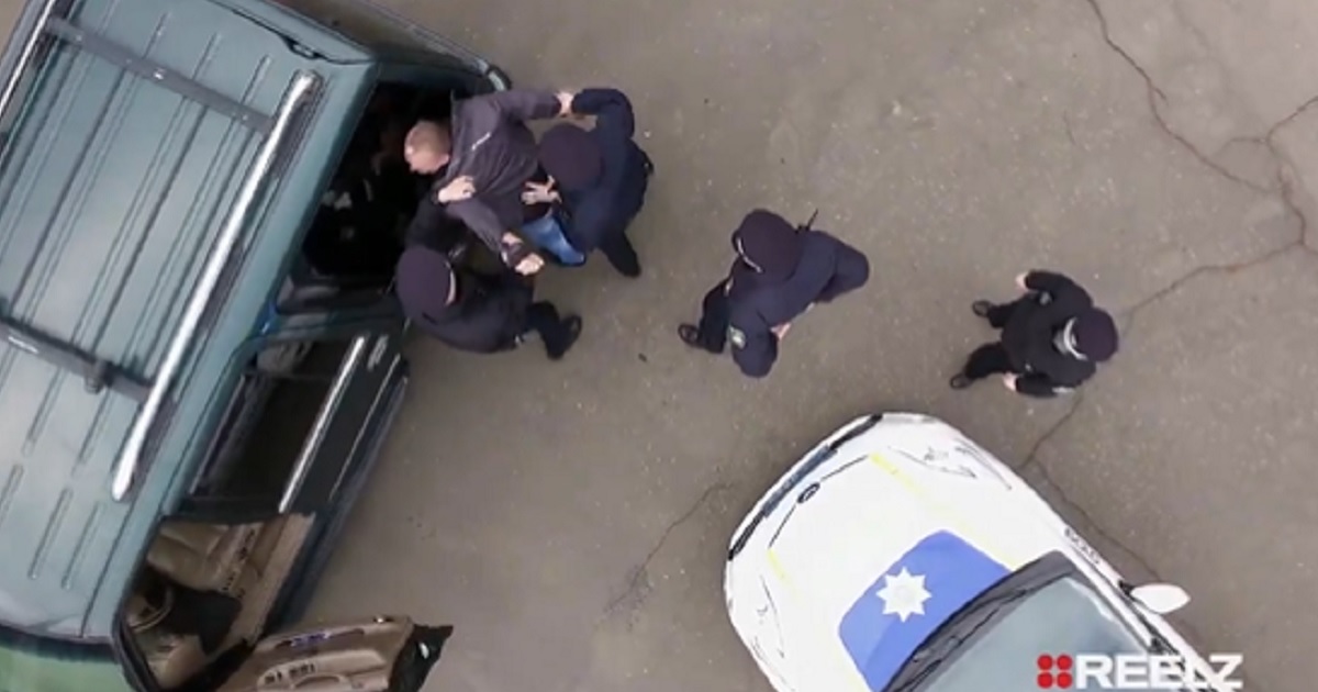 An overhead shot of an arrest from the new "On Patrol: Live," the rechristened "Live PD."
