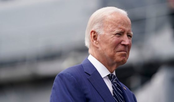 President Joe Biden waits before giving remarks on inflation and supply chain issues at the Port of Los Angeles on Friday in Los Angeles.