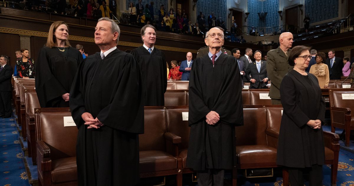 Supreme Court Justices Amy Coney Barrett, John Roberts, Brett Kavanaugh, Stephen Breyer and Elena Kagan attend the State of the Union on March 1, in Washington, D.C.