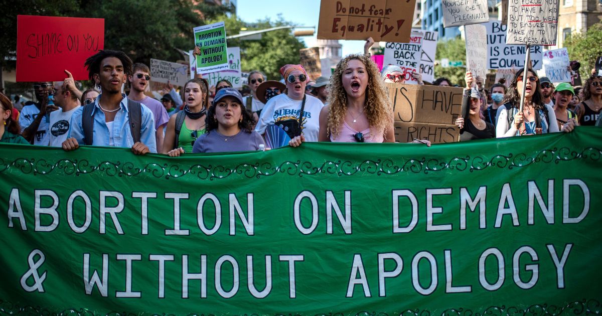 Pro-abortion protesters march in Austin, Texas, on Saturday after the Supreme Court overturned Roe v. Wade.