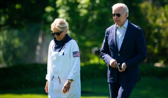 President Joe Biden and first lady Jill Biden arrive on the South Lawn of the White House on Sunday after a weekend in Rehoboth Beach, Delaware.