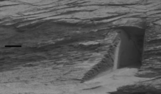 The "doorway" on the Martian surface is really "just the space between two fractures in a rock," according to a project scientist in the Mars Science Laboratory.