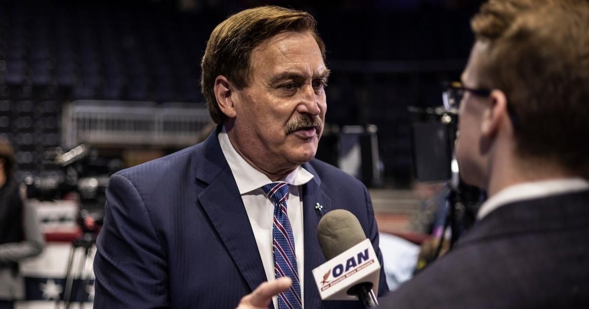 MyPillow CEO Mike Lindell speaks to reporters before former President Donald Trump spoke at a rally on May 28, 2022, in Casper, Wyoming. The rally was held to support Wyoming Rep. Liz Cheney’s primary challenger, Harriet Hageman.