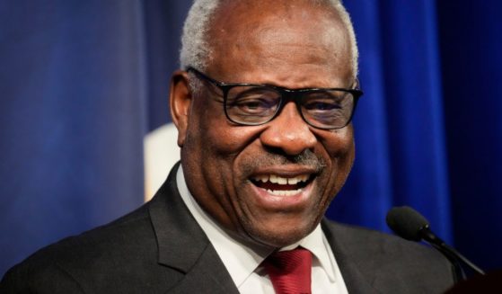 Supreme Court Justice Clarence Thomas, pictured grinning at a Heritage Foundation event in October.