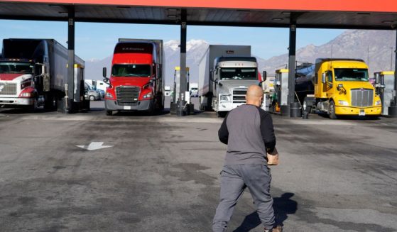 Trucks fuel up at a truck stop Springville, Utah, in December.