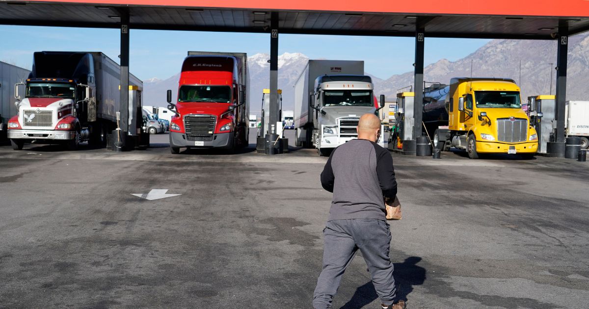 Trucks fuel up at a truck stop Springville, Utah, in December.