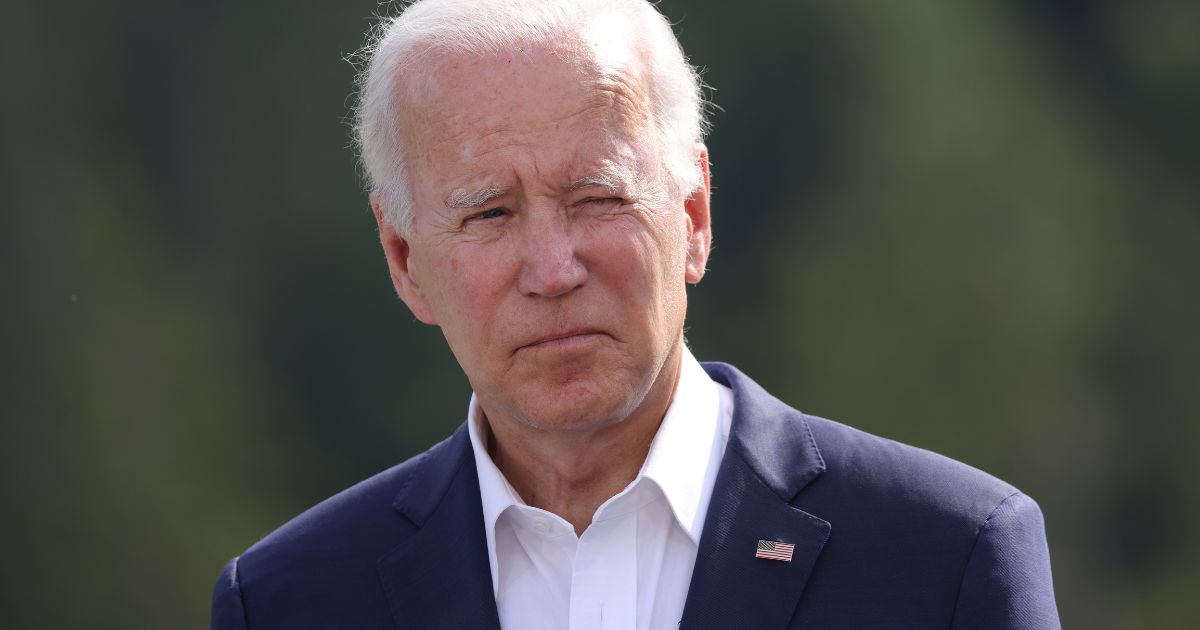 President Joe Biden squints into the sun during a meeting at the G7 summit in Garmisch-Partenkirchen, Germany.