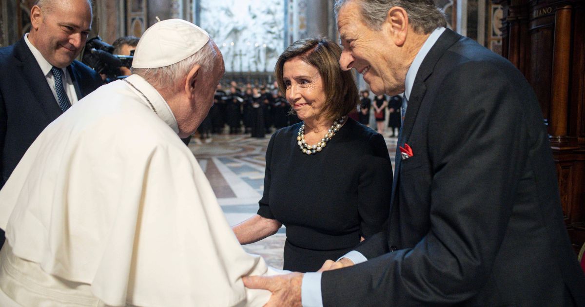 House Speaker Nancy Pelosi and her husband, Paul, greet Pope Francis on Wednesday before Mass at St. Peter's Basilica in Vatican City.