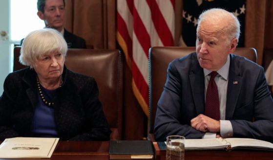 U.S. Secretary of the Treasury Janet Yellen, left, and President Joe Biden, right, talk to reporters from the Cabinet Room of the White House prior to a March 3 cabinet meeting.