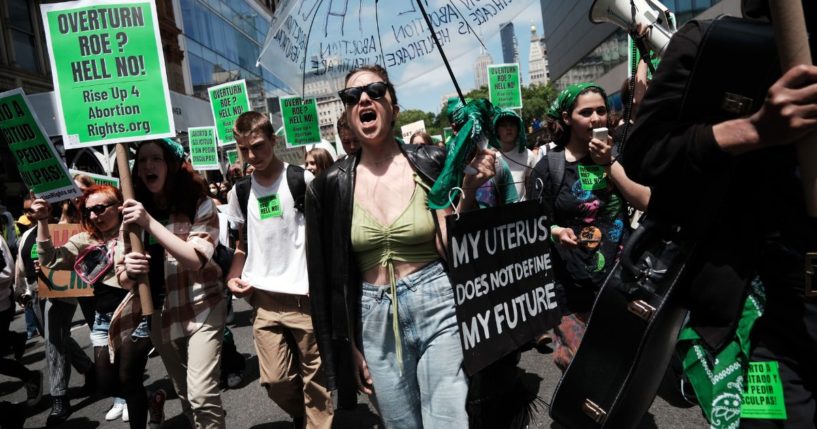 Students participate in a march in Manhattan to show their support for abortion and gun control on May 26 in New York City.