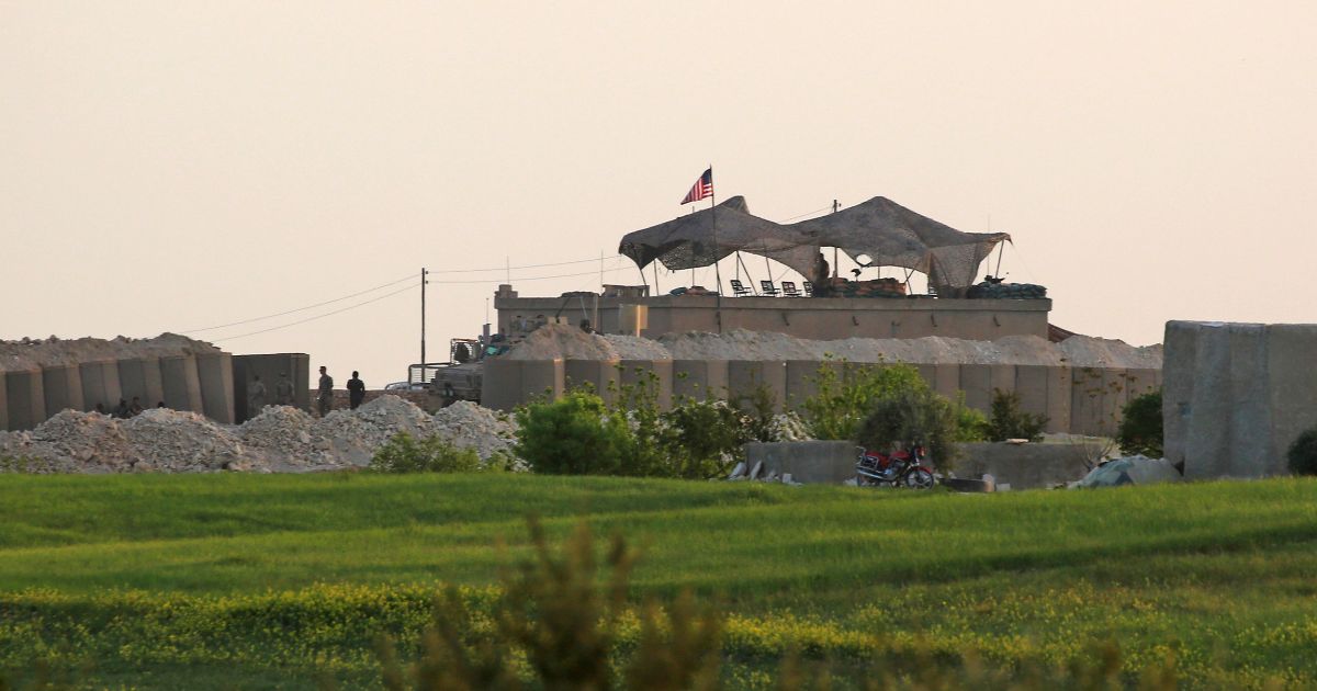 The image shows a U.S. military base in the Dadat village, north of the Syrian town of Manbij that was taken on April 2, 2018.