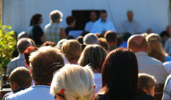 Congregants attend a church service in this stock image.