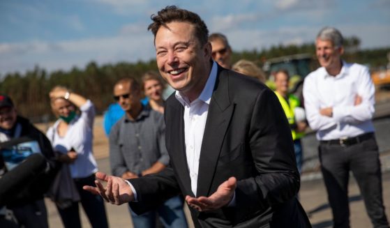 Tesla and SpaceX CEO Elon Musk talks to the press as he arrives to view the construction site of the new Tesla Gigafactory near Berlin, on Sept. 3, 2020.