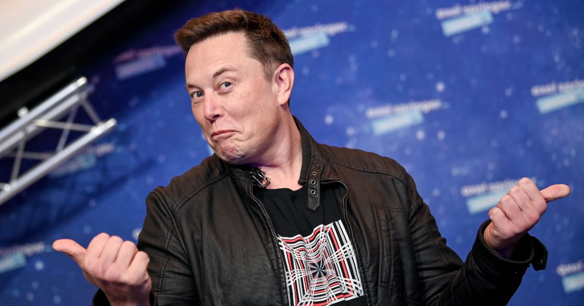 SpaceX and Tesla CEO Elon Musk poses as he arrives for the Axel Springer Awards ceremony in Berlin, on Dec. 1, 2020.
