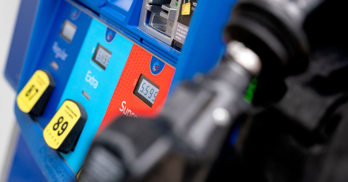 Gas prices are displayed on a pump at an Exxon gas station in Washington, D.C., on May 24.