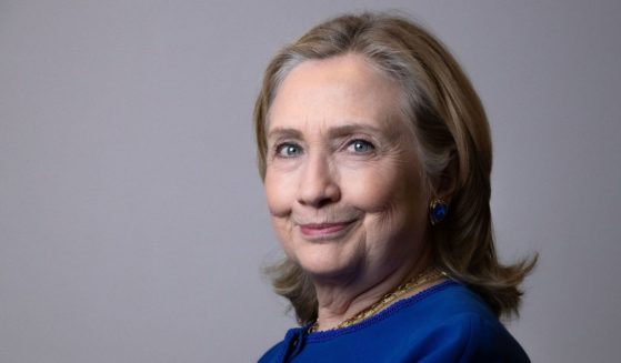 Former Secretary of State Hillary Clinton poses during a photo session in Paris, on June 10.