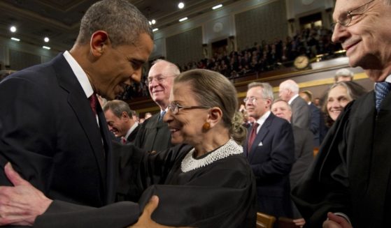 Then-President Barack Obama greets Supreme Court Justice Ruth Bader Ginsburg before his State of the Union address on Capitol Hill in Washington, D.C., on Jan. 24, 2012.