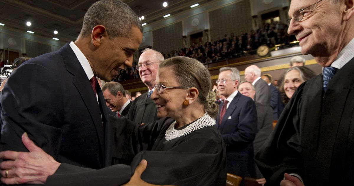 Then-President Barack Obama greets Supreme Court Justice Ruth Bader Ginsburg before his State of the Union address on Capitol Hill in Washington, D.C., on Jan. 24, 2012.