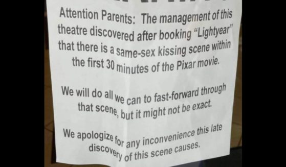 A theater in Kingfisher, Oklahoma, posted a sign stating that they would be fast-forwarding through the same-sex kissing scene in the film "Lightyear".