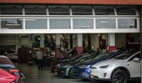 Tesla cars sit inside the service garage at a Tesla dealership in Brooklyn, New York Clty, on Aug. 7, 2018.