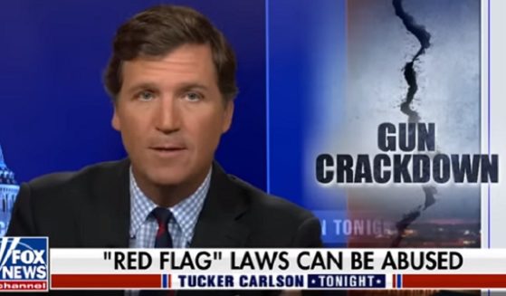 Fox News host Tucker Carlson dissects "red flag laws" on his program Monday night.