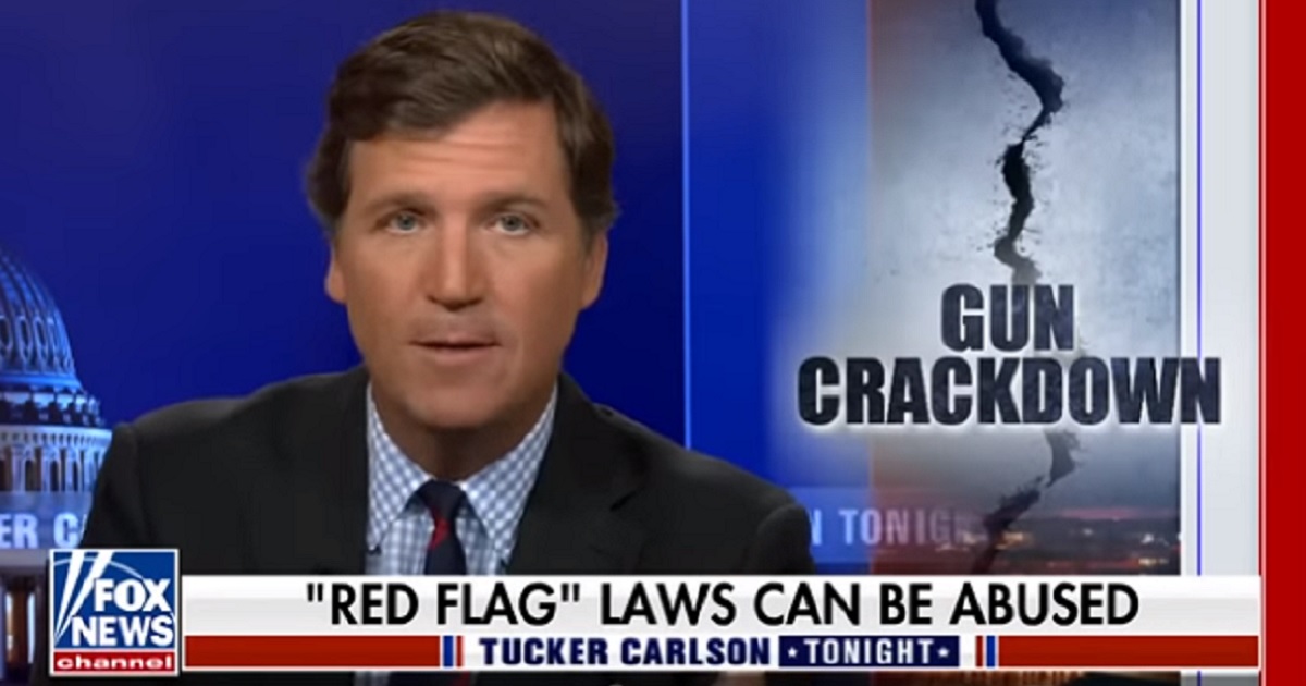 Fox News host Tucker Carlson dissects "red flag laws" on his program Monday night.
