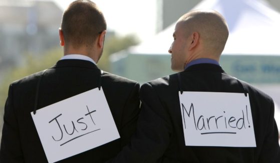 A same-sex couple walk arm in arm after they were married at San Francisco City Hall June 17, 2008, in San Francisco, California.