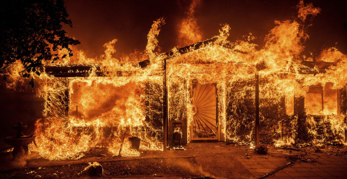 Flames consume a home
