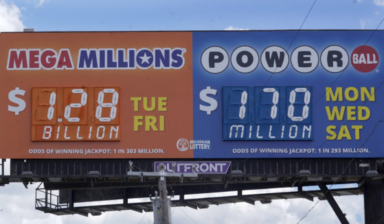 A sign displays the Mega Millions lottery jackpot Friday in Detroit.