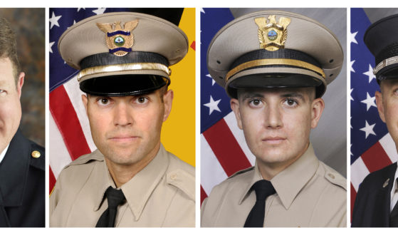 This combo of undated images provided by the Bernalillo County Sheriff's Office and Bernalillo County Fire Department, shows, from left, Undersheriff Larry Koren, Lt. Fred Beers, Deputy Michael Levison and county Fire and Rescue Department Specialist Matthew King. The four were killed in a crash of a Bernalillo County Sheriff's Office helicopter that was headed back to Albuquerque after assisting firefighters in another New Mexico city, authorities said Sunday.