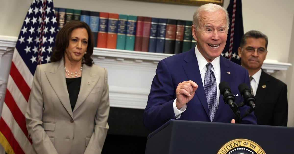 Vice President Kamala Harris, left, and Health and Human Services Secretary Xavier Becerra, right, appeared at times to struggle to keep straight faces as President Joe Biden bumbled his way through remarks about abortion at the White House Friday.