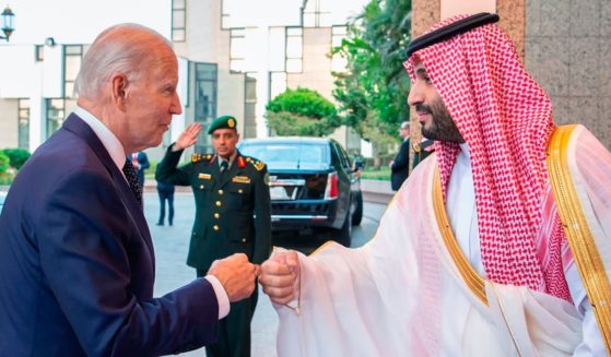 Saudi Crown Prince Mohammed bin Salman, right, greets President Joe Biden with a fist bump after his arrival in Jeddah, Saudi Arabia, on Friday.