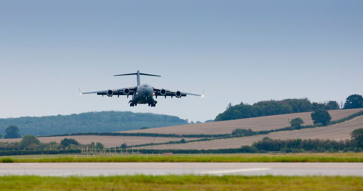An RAF C17 Globemaster air transport troop and cargo plane lands at RAF Brize Norton Air Base in Oxfordshire, U.K., on Aug. 20, 2021.