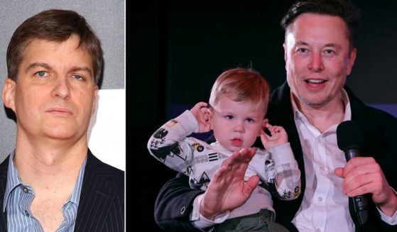 "The Big Short'" investor Michael Burry had criticism for Elon Musk (pictured in December 2021 with his son, known as "X") for adding more children to a broken home.
