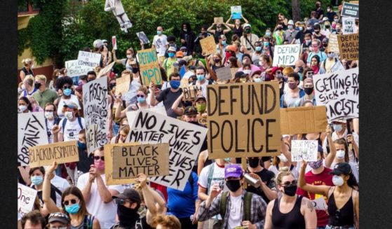 Anti-police protesters march in Minneapolis on June 6, 2020.