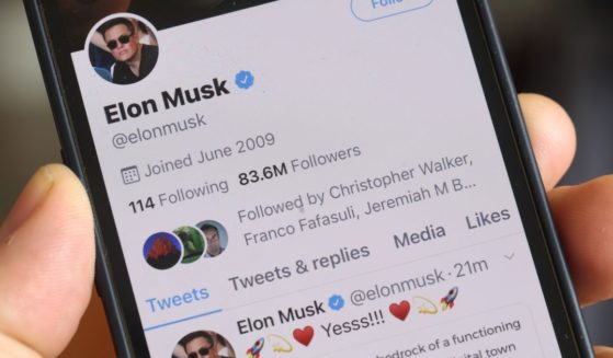 The Twitter profile of Elon Musk is shown on a cellphone on April 25 in Chicago.