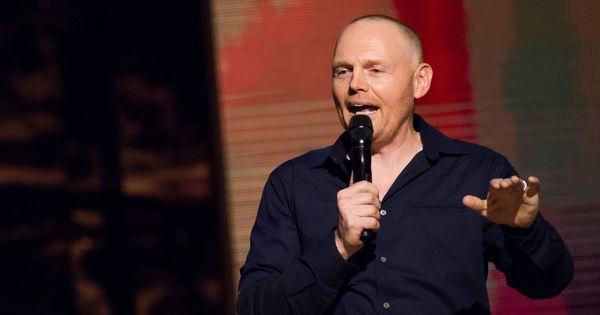 Bill Burr is speaking onstage at Comedy Central's "Night of Too Many Stars: America Comes Together for Autism Programs" in New York City on Feb. 28, 2015.