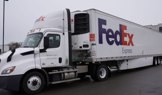 A FedEx truck leaves the McKesson distribution center in Olive Branch, Mississippi, on Dec. 20, 2020.